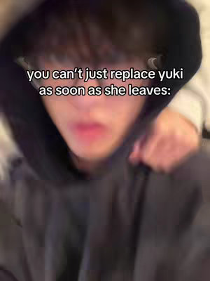 The image is a close-up shot of a person in a dark hoodie, with a focus on their face and the text overlayed on the top. The background is out of focus, which keeps the focus on the person.