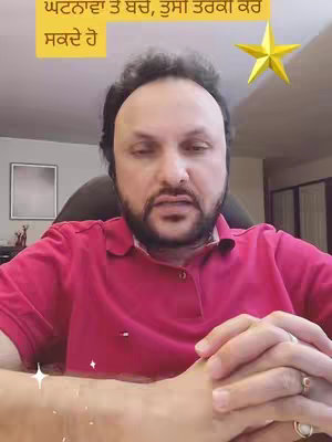 A man with a beard and a red shirt is in the mid-ground, with text in a yellow rectangle and a star in the top right corner. The background is blurred and appears to be indoors.