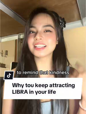 A young woman with long dark hair and makeup looks directly at the camera and speaks. Overlaid text provides context, and the background is a softly lit indoor setting.