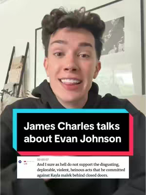 The image shows James Charles smiling and speaking. A text box overlaid on the bottom of the screen has the title 'James Charles talks about Evan Johnson' with quoted text underneath from a news source. The backdrop is a modern-looking room with art on the wall.
