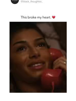 A close-up shot of a woman on the phone, looking up with a thoughtful expression. She is holding a red phone. The background is blurred and suggests an interior setting.