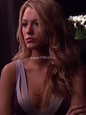 A woman with blonde hair looks downwards with a slight frown. Text overlayed on the image reads "august VIRGO vs."