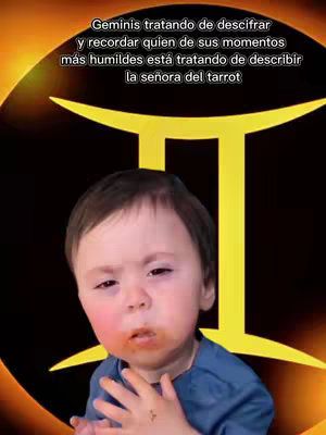 The cover image features a baby's face in the foreground, with a slightly quizzical expression, a bit of food on the mouth, and a blue top. Behind the baby, there is a yellow Gemini astrological symbol against a dark background.