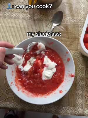 The cover image shows a top-down view of a bowl filled with a red, chunky sauce, presumably strawberry sauce. White dollops of what appears to be sour cream or whipped cream are artfully placed on top. A spoon with more cream is in the bowl. The image is taken indoors, with a patterned tablecloth visible.