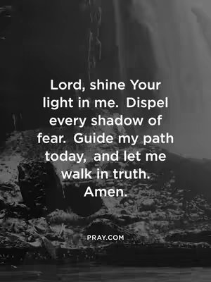 A black and white image featuring a mountainous or rocky textured background with text overlayed. The text is centered, with lines of prayers, and the website PRAY.COM at the bottom. The overall composition has a spiritual and reflective feel, accentuated by the monochromatic color scheme.