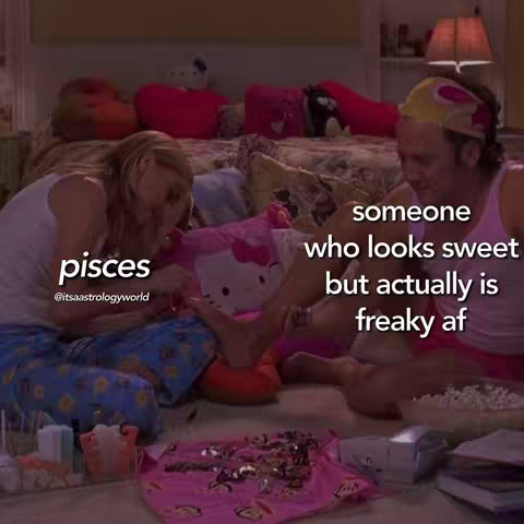 A bedroom scene with two people, one holding a Hello Kitty pillow, and text overlays. The background has a bed with pillows and a lamp. The color palette is soft, with pink and blue tones. The overall composition is busy, with multiple elements filling the frame.
