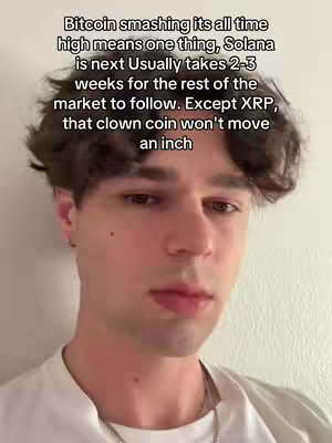 The cover image features a close-up of a young man's face. He has short, dark, wavy hair. He's wearing a white t-shirt and a silver chain. Above him, there is text in a sans-serif font in white text.