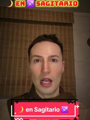 A man with short dark hair looks directly at the camera. The background features a light brown window shade. Overlayed on the image are text boxes with astrological symbols and text.