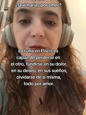 A selfie-style video cover with a woman wearing headphones and a necklace. Text overlays are present at the top and bottom of the image. The woman has brown hair and a neutral expression. The background seems to be indoors.