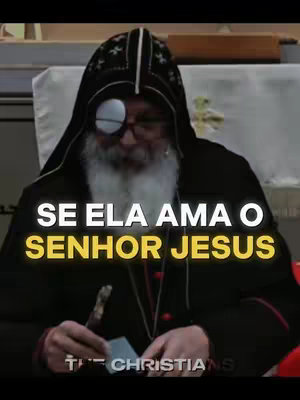 The cover image displays a man in religious garb with an eyepatch, seated indoors. Overlayed text reads, 'SE ELA AMA O SENHOR JESUS'. The image is composed of a medium shot with a focus on the man.