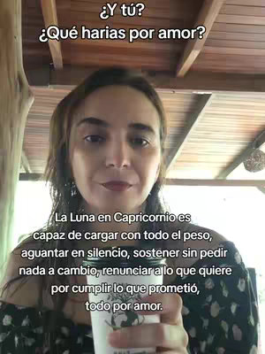 A woman with brown hair and a neutral expression is holding a white cup. She is framed from the chest up, appearing to be indoors under a wooden structure. Text overlays appear at the top and bottom, formatted in a vertical style. The image is vertically oriented, typical of social media posts.