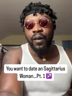 A man with a beard, wearing round sunglasses and a white tank top, looks directly at the camera. Text overlayed on the bottom reads, "You want to date an Sagittarius Woman...Pt. 1" with the Sagittarius symbol.