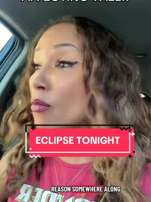 A woman with long, wavy brown hair looks to her left, appearing contemplative, in a selfie taken from inside a car. Overlaid on the image is a red rectangle with the text "ECLIPSE TONIGHT," and below that, partially visible text that reads "REASON SOMEWHERE ALONG."