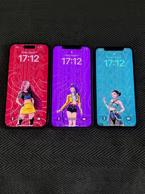 Three iPhones displayed side-by-side on a dark textile background with the wallpapers visible. From left to right, the phone screens showcase vibrant anime-style character designs: the first features a red backdrop with a character named 'Mira', wearing a yellow skirt, black top, and long hair. The second displays a purple background with the name 'Rumi', with a character in a sports jacket. The last has a sky-blue background, with the name 'Zoey'.