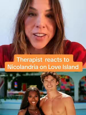 The cover image features a split layout. The top portion showcases a close-up of a woman's face, likely the video's host, with a red shirt, positioned centrally against a light background. Below, a dynamic scene from 'Love Island' is depicted, featuring a smiling man and woman in what appears to be an outdoor setting. An informational banner that overlaps both sections of the image reads: "Therapist reacts to Nicolandria on Love Island".