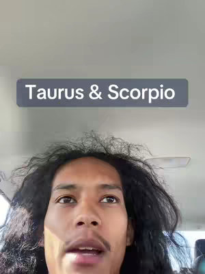 The cover image features a man with long, curly black hair, looking up slightly with a neutral expression. Above him is a gray rectangular box with the words 'Taurus & Scorpio' in white text. The background appears to be the interior of a vehicle, with a light-colored ceiling and visible elements.