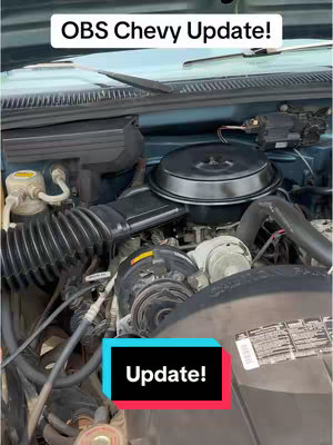 The cover image shows a close-up view of a car engine with various parts visible. The background is slightly blurred, allowing the engine details to stand out. The top of the image features a white text overlay. Below, a colored bar with white text is present.