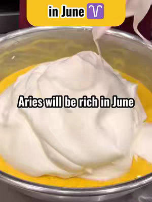 The cover image shows a close-up of yellow liquid in a silver bowl, with a large portion of white, whipped topping on top, and more of the liquid and topping being poured from above. Text overlays are added.