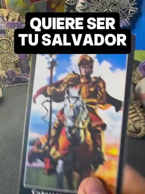 The cover image displays a tarot card with a person on a horse, possibly a knight, in a golden armor. The rider is on a white horse and the card has a light blue sky in the background. Text overlaid at the top says, \"QUIERE SER TU SALVADOR\" (Wants to be your savior).