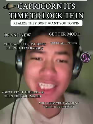 A selfie-style video cover with a smiling young man in the center. Text overlays feature motivational and astrological cues. The background is slightly out of focus.