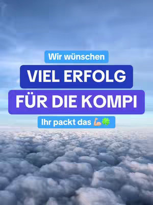 The cover image features a cloudy sky as a background. Overlaid on this are several rectangular text boxes with bold white text. The top text box displays "Wir wünschen", followed by a blue box stating "VIEL ERFOLG" in large, white letters. Below is another blue box that says "FÜR DIE KOMPI". Finally, at the bottom, is a green box with the words "Ihr packt das" and a flexed bicep and a four-leaf clover.