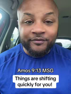 A man is sitting in a car, looking towards the camera. The image has a text overlay with a bible verse.