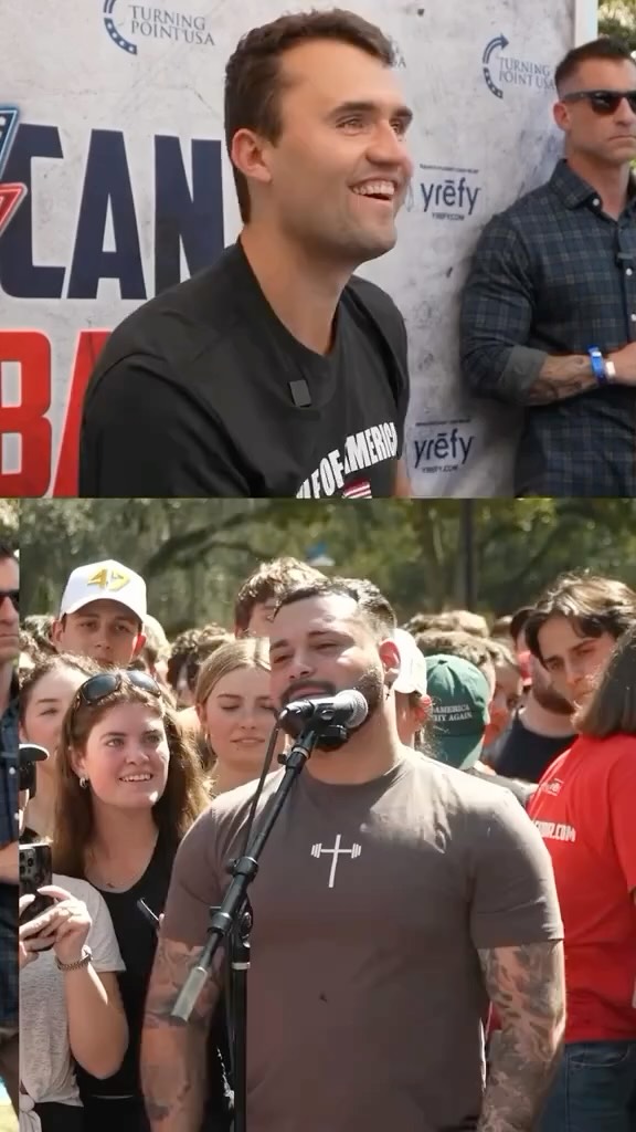 The image is a split screen. The top half shows a smiling man in a black t-shirt near a sign that says "AMERICAN" and the "TURNING POINT USA" logo. The bottom half shows a man with a beard on a microphone, wearing a gray shirt with a cross and an exercise symbol, speaking to a crowd.