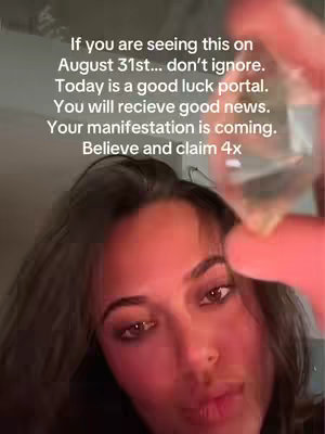 A selfie-style video cover image showing a woman. The woman is holding a crystal towards the camera. The background is out of focus, and the lighting is soft. The text overlay is above the woman's face.