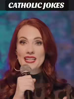 A woman with red hair, wearing a black top, speaks into a microphone. Above her, a black banner displays white text.