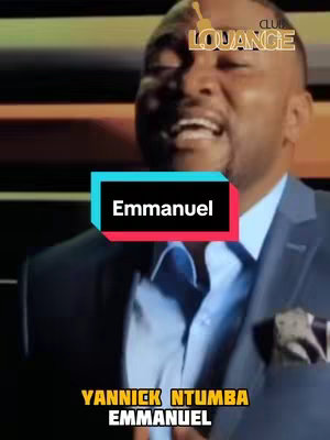 The image shows a man with a serious expression, likely mid-speech, set against a blurred background. A text overlay with the word "Emmanuel" is placed on the man's chest. The image is cropped and the man appears to be in a suit.