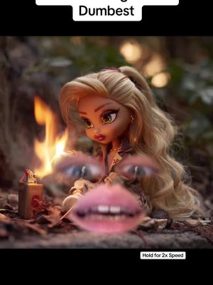 A vertical video cover image featuring a doll with blonde hair and makeup, sitting in front of a fire. The doll appears to have a blurred overlay of eyes and a mouth over its face. Text overlays appear at the top and bottom of the image.