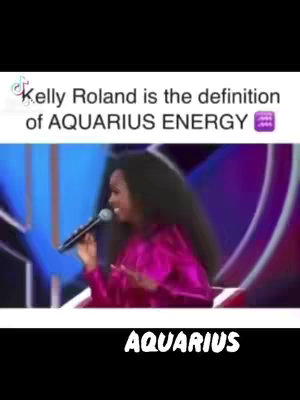 The cover image features a woman on a stage holding a microphone. The text 'Kelly Rowland is the definition of AQUARIUS ENERGY' is overlaid at the top with the tiktok logo. At the bottom, the word 'AQUARIUS' is written.