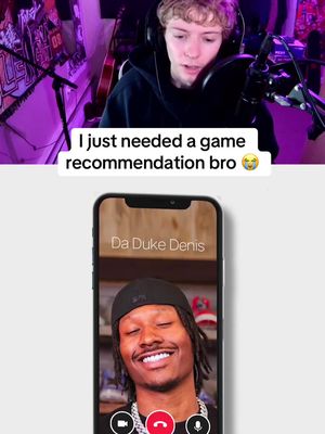The cover image is a split-screen composition. The upper portion displays a young man, wearing a black hoodie and headphones, looking directly into the camera. Below this, a smartphone graphic shows a video call interface; the recipient is a man with a black cap, necklace, and a confident smile. The phone graphics are arranged centrally, superimposed over a blurred background setting suggesting an indoor or studio environment, with the upper section in a purple hue. Above the phone is white text that reads 'I just needed a game recommendation bro' with a laughing emoji at the end.