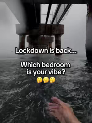 Image shows a view from under a pier, with dark water reflecting the sky. Text overlays read, 'Lockdown is back...' and 'Which bedroom is your vibe?' Hands are visible in the foreground .