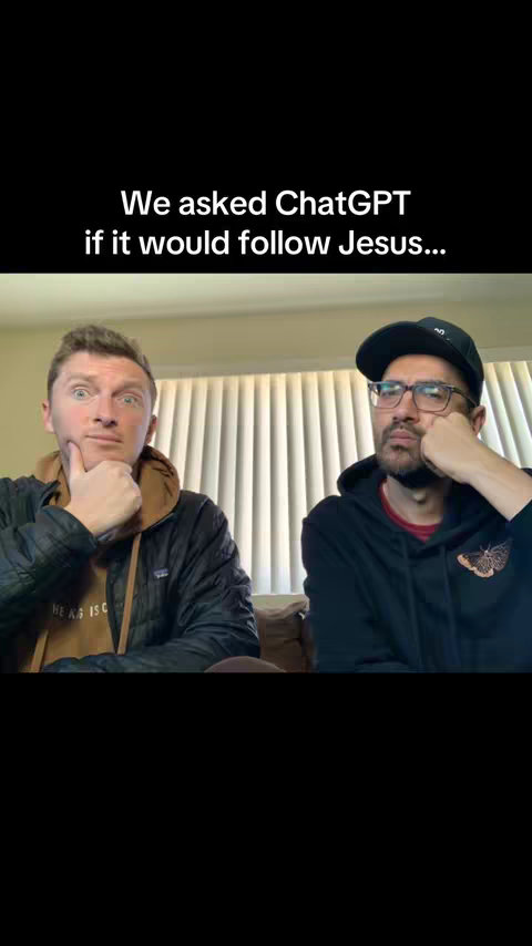The image shows two men in front of a light-colored wall with a window behind them, with blinds. Text overlay at the top that says: We asked ChatGPT if it would follow Jesus.... One man is on the left with a surprised expression and hand on his chin, while the other man is leaning on his hands appearing more thoughtful or serious.
