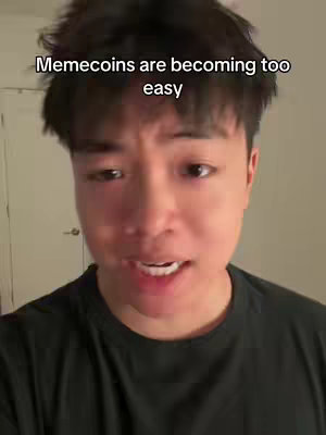A close-up shot of a young Asian man looking directly into the camera and speaking. The background features a plain interior with a door faintly visible. The man is wearing a black t-shirt. Text in a white sans-serif font overlays the image, placed at the top.