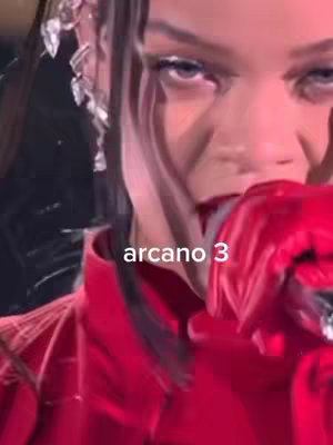 Close-up of a person's face, likely a woman, with intense makeup and red lipstick. The image has applied text overlay.