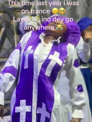 The cover image shows a woman in a church robe of white and purple holding her face up and back, with the text of the caption written over her, there are other people blurred in the background