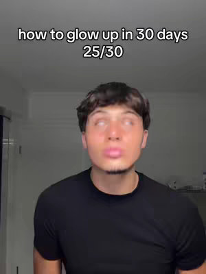 The cover image shows a young man with short dark hair and a black t-shirt gazing upwards. Text overlay at the top indicates 'how to glow up in 30 days' and '25/30'. The background appears plain with a light-colored wall or surface, contributing to a simple, focused composition.