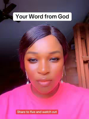 A woman with dark hair, a pink shirt and a serious expression, is centered in the frame. The upper portion of the image features text in a white box, and at the bottom is a smaller text in a red rectangle. The background includes a ceiling fan and a window.