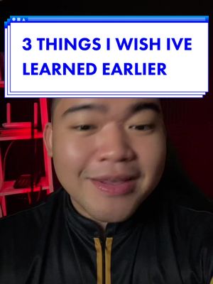 The cover image shows a close-up of a young man with a wide smile, looking directly at the camera. He has short, dark hair and fair skin. Above him is a rectangular text box in a gradient blue and white, containing the overlaid text. The background is a dark red, which adds contrast to the bright text box and the man's face. The man is wearing a black jacket with gold stripes. The overall composition is well-lit, with a focus on the man and the text, the red light creates a warm and inviting environment.