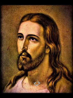 The cover image features a portrait of Jesus Christ. He is depicted with long, flowing brown hair and a beard. His eyes are looking upwards. The image has a classic, slightly aged look, with a soft color palette.
