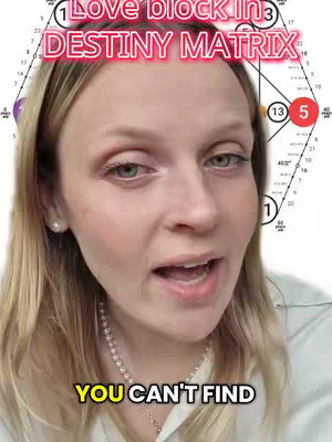 The cover image shows a woman with blonde hair speaking, with the words "Love block in DESTINY MATRIX" overlaid in a pink box at the top. Behind her is a chart, likely related to astrology or numerology. The background is blurred, focusing attention on her face.