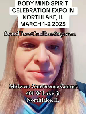 A selfie-style photo featuring a woman with long blonde hair against a light background. White text is overlaid on the top third, announcing a Body Mind Spirit Celebration Expo on specific dates and location. The woman has a neutral expression.