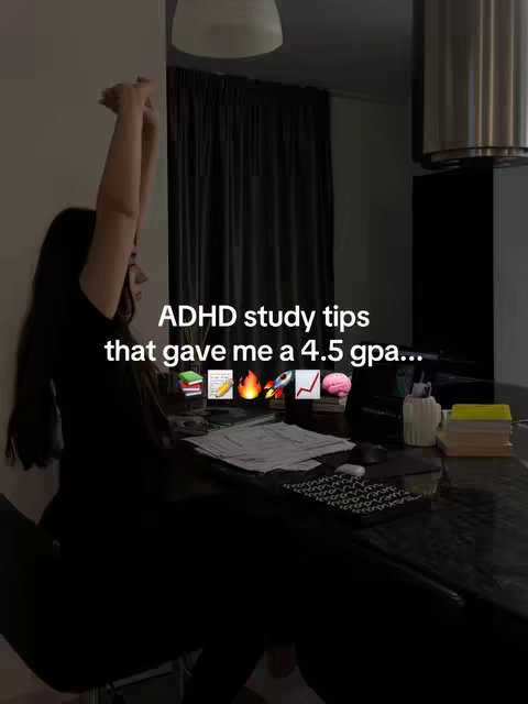 A woman with long dark hair is standing near a desk and stretching her arms up. The text overlay reads "ADHD study tips that gave me a 4.5 gpa..." with several emojis.