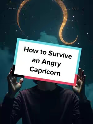 The image is a vertical shot with a dark, atmospheric background. A blurred figure is holding up a rectangular sign with the text 'How to Survive an Angry Capricorn' in a bold, sans-serif font. The sign has a white background with the text in black, outlined by a pink and a black border. Above the figure, a golden, stylized Capricorn symbol is visible, set against a backdrop of a slightly cloudy sky with small stars, suggesting a night or evening setting.
