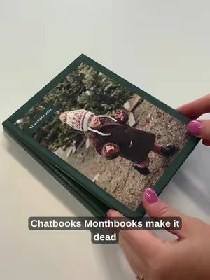 A photo journal is displayed, held in hands, with a child's photo on the cover. The journal is green, with the child's photo in the center.