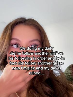 A young woman with long brown hair covers her mouth with her hand. Overlayed text indicates a relatable dating issue.