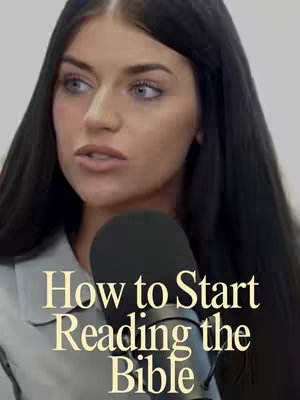 A woman with long dark hair, wearing a light-colored collared shirt, is speaking into a microphone. The text "How to Start Reading the Bible" is overlaid near the bottom of the frame in a light beige color.