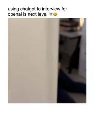 The cover image appears to be a screenshot of a real-world setting, likely indoors. The primary visual element is a white wall occupying the left side, with a slight vertical strip of an image on the right. The area lacks defined details due to the blur effect where some part of the man is placed.